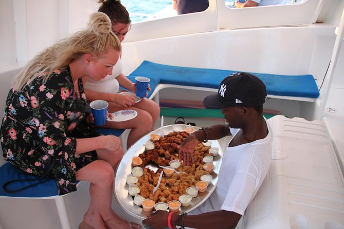 3 hour Glow Worm Sunset Cruise from Providenciales - Meeting Ross, Angelo, and the crew