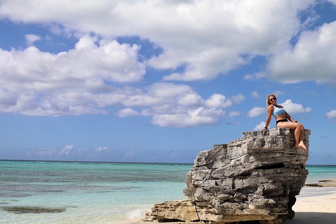 4hour Group Half Day Snorkeling Excursion in Grace Bay - The final swim stop with slides and a rooftop jump board
