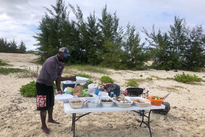 7 Hour Private Catamaran Sail, Snorkel and Beach BBQ Grace Bay, Providenciales - A charcoal barbecue on the beach