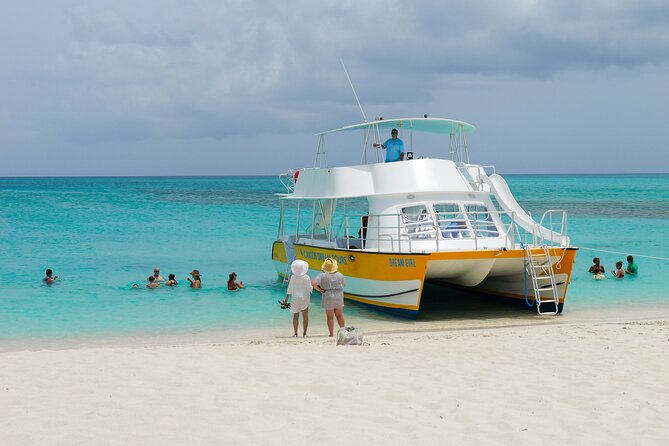Afternoon Half Day Cruise from Providenciales with Snorkeling and Iguana Island - Grace Bay views on the way back