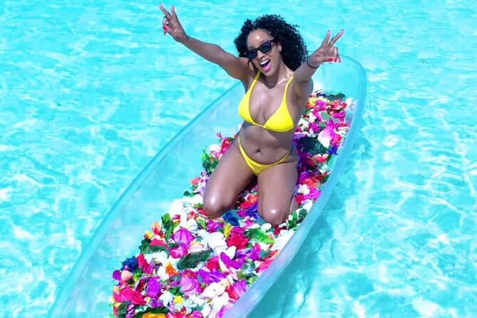 Clear Kayak Flower Girl Photoshoot in Turks and Caicos Islands - A flower-covered kayak on Leeward Beach