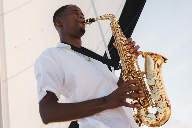 Deluxe Sunset and Saxophone Sail on Luxury Lady Grace Catamaran - Setting sail from The Ritz-Carlton beach