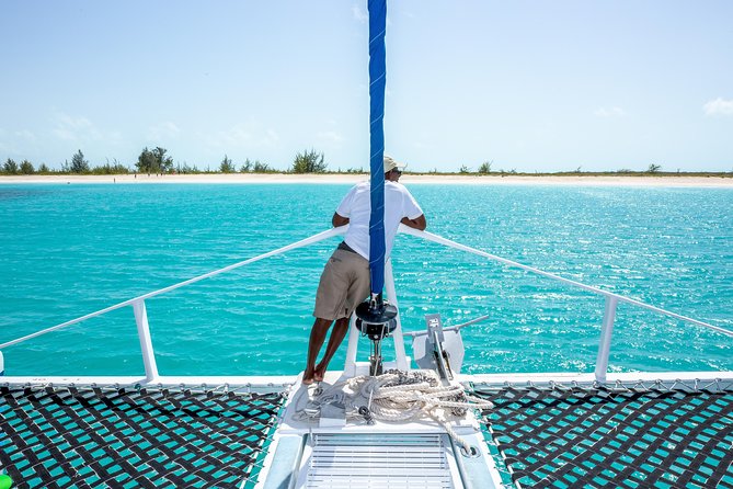 Family Catamaran & Snorkeling Cruise Turks & Caicos - Snacks, an open bar, and a live DJ keep the boat lively