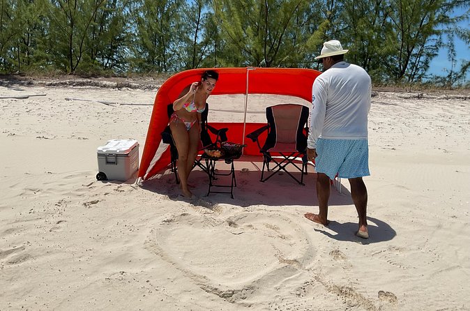 Full-Day Private Island Getaway in the Turks and Caicos Islands - Snorkeling in clear Caribbean water