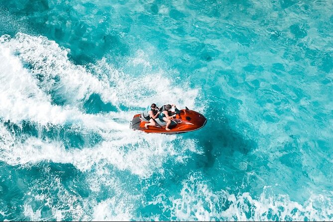 Jet Skiing around La famille ship and smaller pristine cays - Getting Comfortable on the Jet Ski