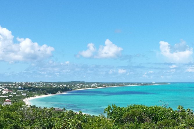 N&G Providenciales Island Tours of Turks and Caicos - Sapodilla Bay Hill combines carvings and broad views