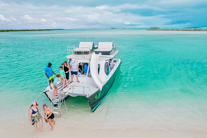Private 4 Hour Power Catamaran Excursion in Grace Bay - Cruising past Pine Cay and Fort George Island