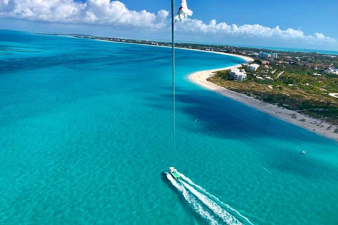 Private 4hr Parasail - Snorkel & Water-Sports Adventure, Turks and Caicos - Flying above Grace Bay