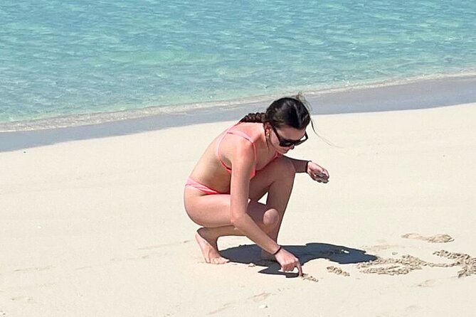 Private Boat Tour with Snorkeling, Island Hopping, and Noahs Ark - Grace Bay Beach for swimming and snorkeling