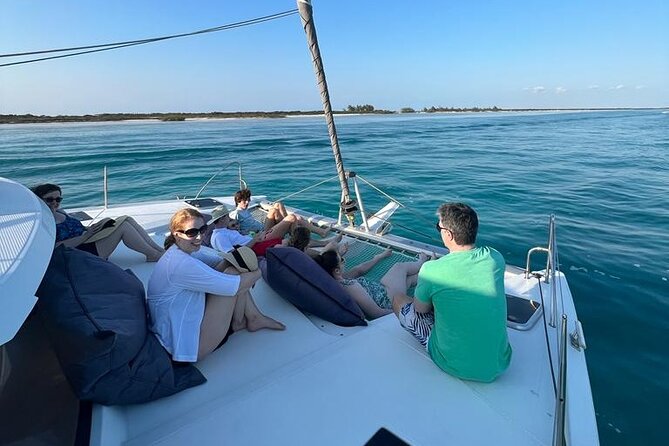 Private Half-Day Catamaran Cruise, Turks and Caicos Islands - Half Moon Bay: sand between two small islands