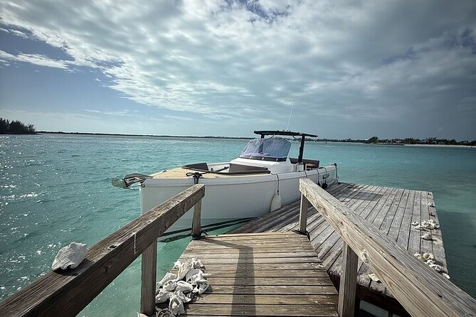 Private Morning Tour Fjord 38 Ben - Half Moon Bay: shallow water and a walk across Pine Cay