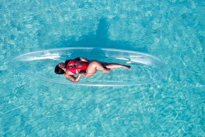 Providenciales Clear Kayak Shoots in Turks and Caicos Island - Posing while the drone hovers above